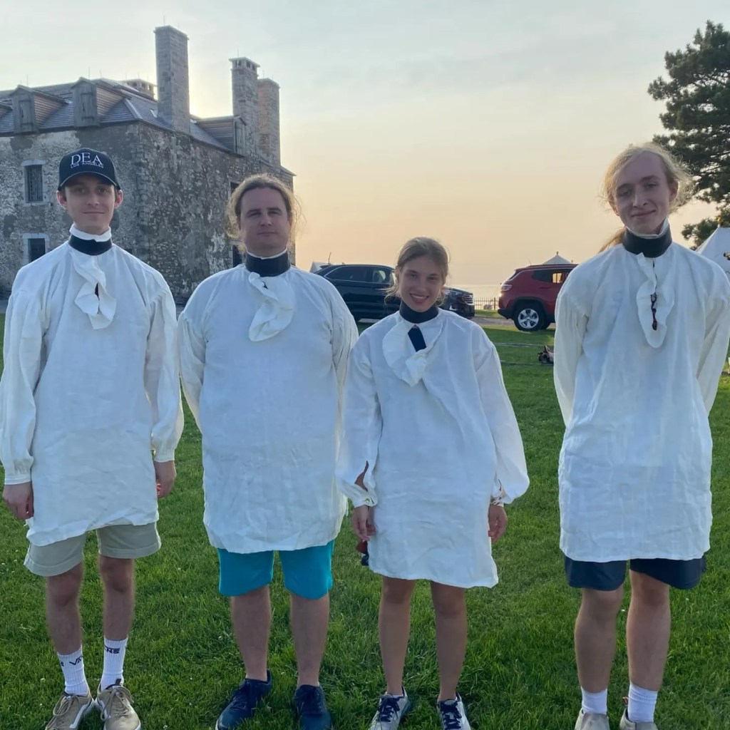 four reenactors wearing our shirts
